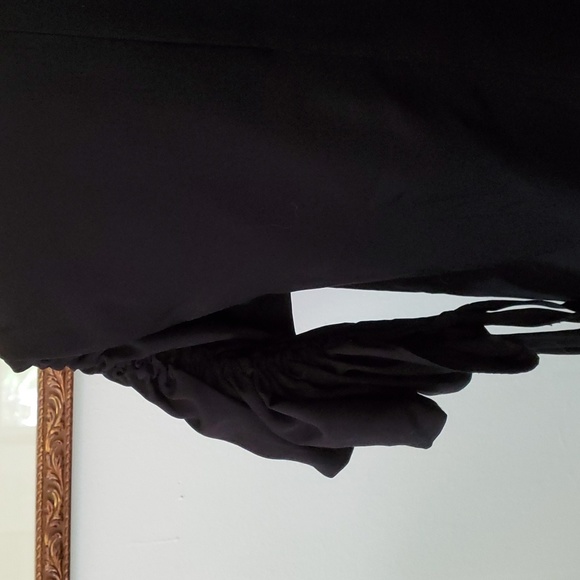 May May, black top with large, gathered sleeves. - Picture 6 of 7